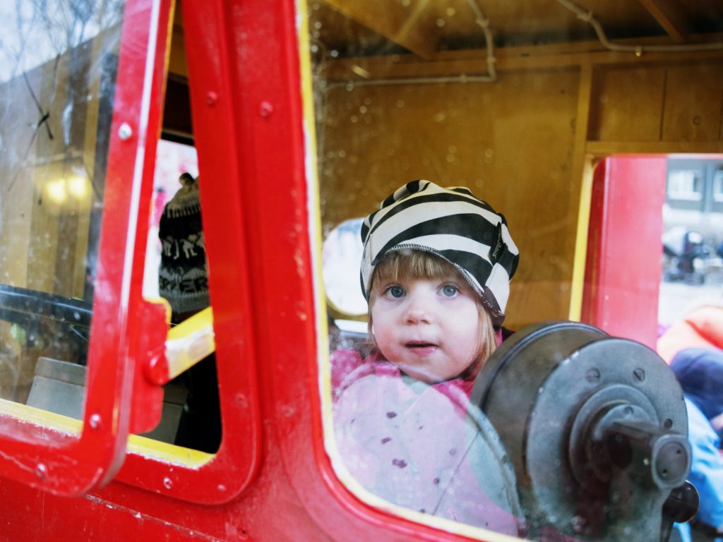 Portrait of little girl in bus